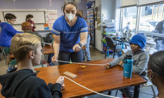 These Durham kids are learning to think like mathematicians, even if they don't realize it. With Duke Assistant Research Professor Maggie Regan. Credit: Jared Lazarus, Duke University Communications