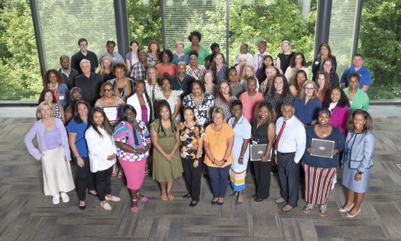 Learning & Organization Development certificate of excellence graduates gather in Penn Pavilion on July 19. Photo by Les Todd.