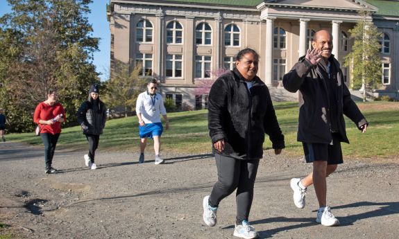 Spring Duke Run/Walk Club participants walk around the East Campus loop. Photo by Les Todd.