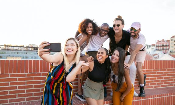A group of people posing for a photo together