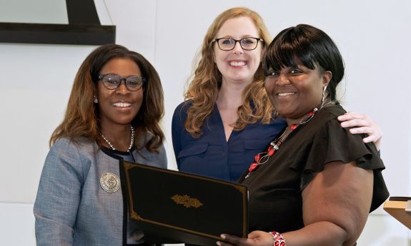 Tomeka Everett is presented with her Certificate of Excellence.