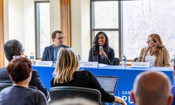 Asher Hilderbrand, Deondra Rose and Sunshine Hillygus speak at discussion of the U.S. 2024 election before students and a collection of visiting international journalists. Photo by Trey Mathews.
