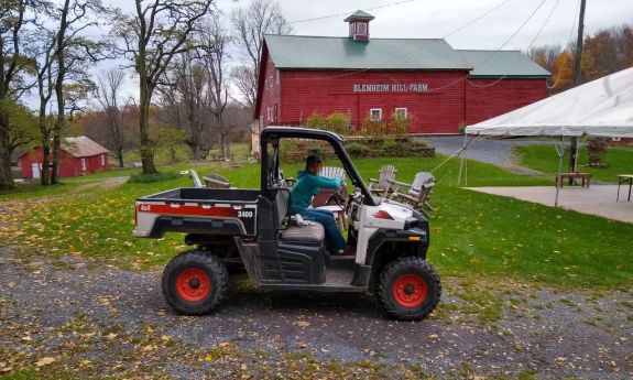 Duke student Montana Lee sits in a vehicle on a farm