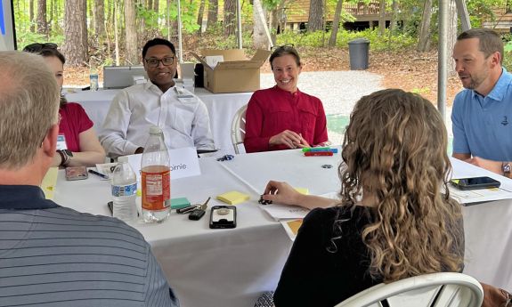 Duke Leadership Academy members at a table.