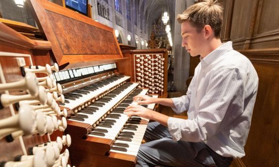 Duke junior Bradley Bowen plays the Chapel's Aeolian organ.