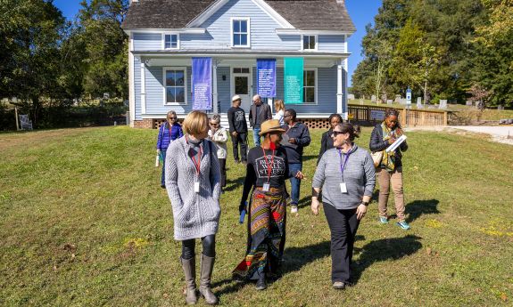 Duke communicators visit the Pauli Murray House at 906 N. Carroll St. in Durham.