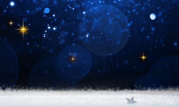 A graphic of a night sky shows twinkling stars