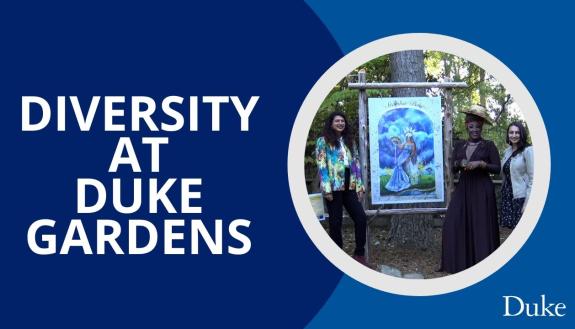 Three people in Duke Gardens with art