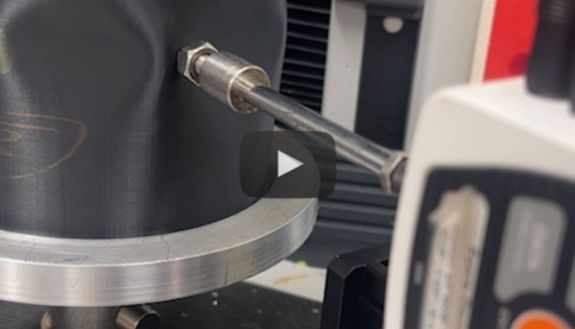 Using 3D-printed cylinders allowed Sage Cooley to conduct novel experiments on their stability by slowly poking the dimpled sides of warped cylinders until their wavy shape realigned into a new pattern.