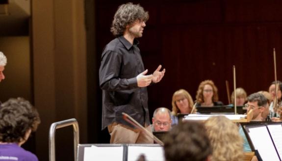 Max Amici conducting the NC Symphony Orchestra