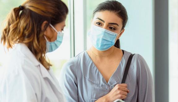 fertility doctor talking with patient