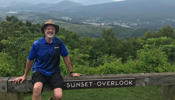 Michael Kurtz, a retired Methodist pastor, takes a break from hiking at Sunset Overlook in North Carolina's high country. He practiced The Daily Examen as part of the Selah study.