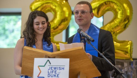 students read during the Jewish baccalaureate service