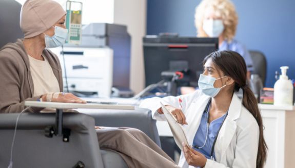 stock image of doctor with cancer painting