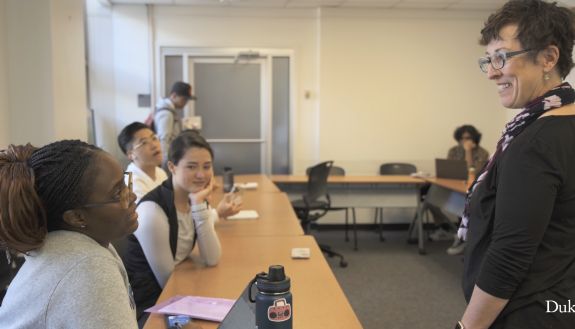 German studies professor April Henry with students. 