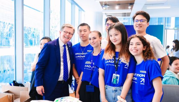 President Vincent Price meets with student orientation leaders at Duke Kunshan University. Photo courtesy Duke Kunshan University.
