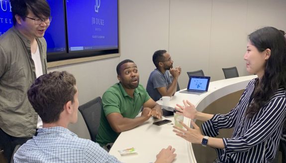 Cook Center students talk between sessions of Diversity Initiative for Tenure in Economics Fellowship Program.