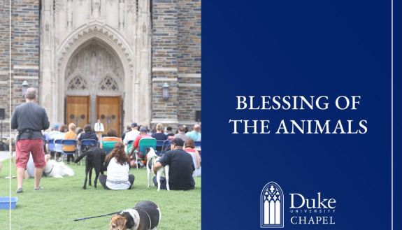 Blessing of the animals with photo of animals and people in front of chapel