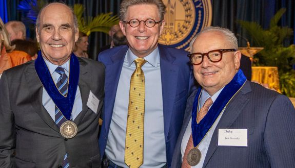 Roy J. Bostock and Jack O. Bovender, Jr. with President Vincent Price