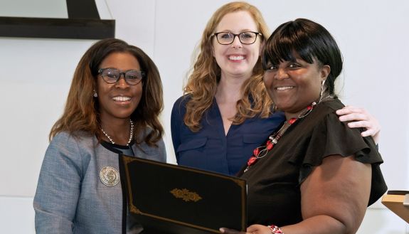 Tomeka Everett is presented with her Certificate of Excellence.