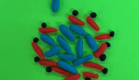 still from claymation video depicting bacteria