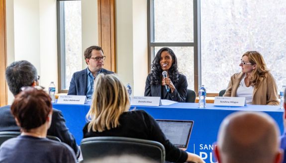 Asher Hilderbrand, Deondra Rose and Sunshine Hillygus speak at discussion of the U.S. 2024 election before students and a collection of visiting international journalists. Photo by Trey Mathews.
