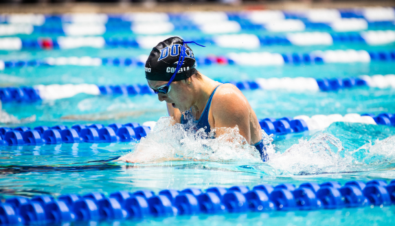 duke swimmer doing the breaststroke in ncaa competition