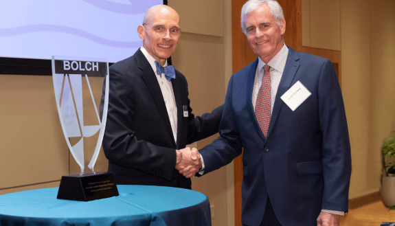 Paul W. Grimm (left) presents the Bolch Prize to Scott O’Connor