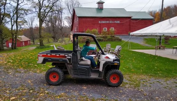 Duke student Montana Lee sits in a vehicle on a farm