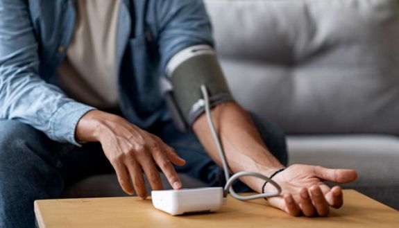 person taking their blood pressure
