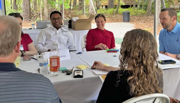 Duke Leadership Academy members at a table.