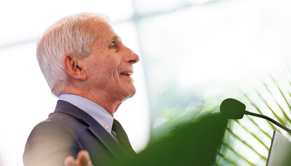 Anthony Fauci at a lectern 