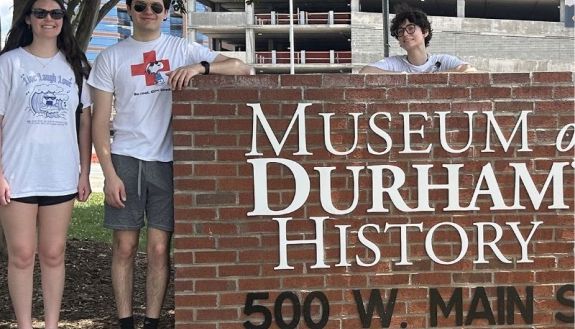 Students in front of the Museum of Durham History