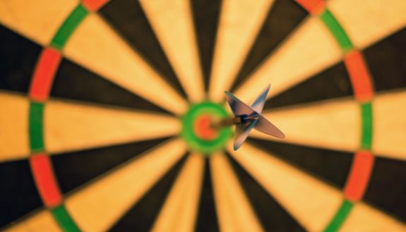 A dart in a dartboard