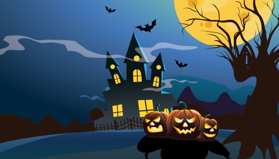 A spooky house with jack-o-lanterns