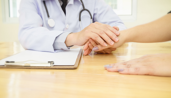 physician advising patient on alternatives to heart transplants