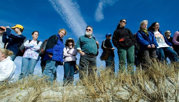 Orrin Pilkey, center, on beach dune with students