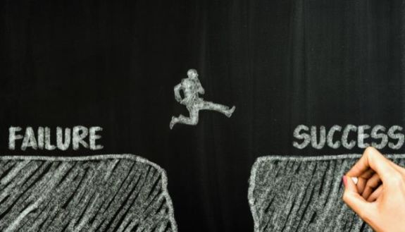 Graphic of person leaping from failure to success