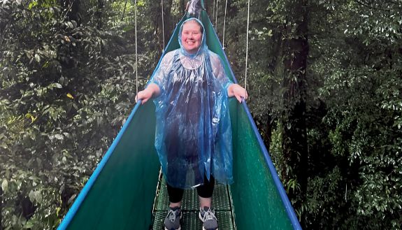 A person on a bridge in Costa Rica.