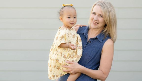 Darla Harvey holds Kara Pace in Wake Forest, NC. Harvey donated a portion of her liver to Kara in 2023.