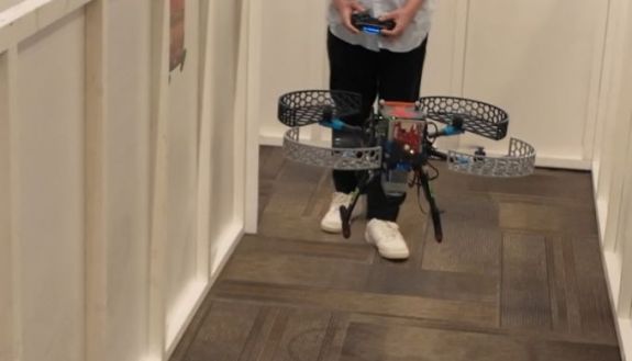 Person holding a drone