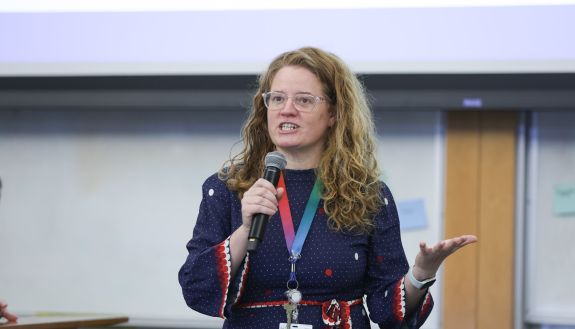 Person speaking with a microphone