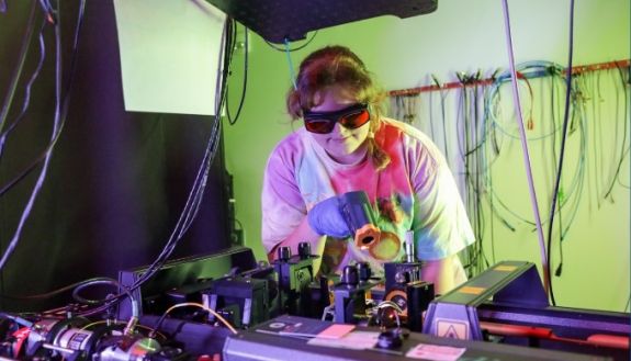 Person standing in front of computer equipment