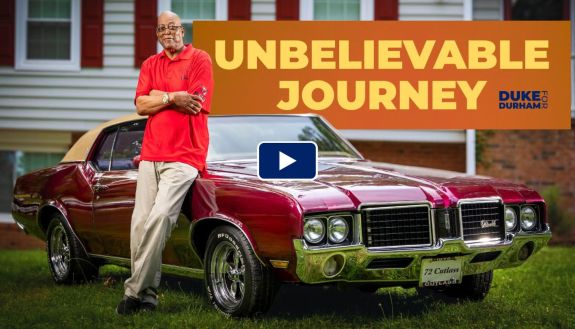 There's a photo of Alfonzo Grafton standing in front of a 1972 car.