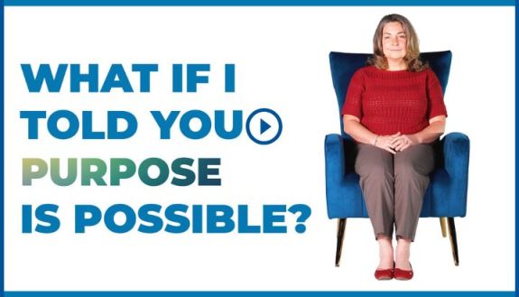 Heather Whitson sitting in a blue chair