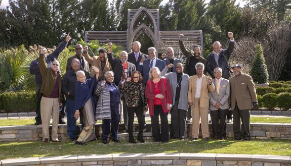 Members of the original group of black student activists who participated in the 1969 “takeover” of the Allen Building gather for a group portrait at Duke Gardens. (Not all pictured.) Credit: Duke University Communications.