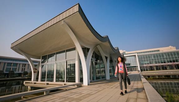Student walks on the new Duke Kunshan University campus.