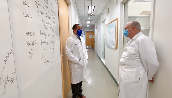 Kevin Saunders, left, and Barton Haynes of the Duke Human Vaccine Institute