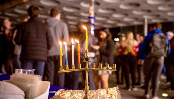 the lit candles show the move through the eight days of Hanukkah
