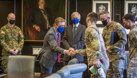 Duke President Vincent Price meets with innovation leaders from the XVIII Airborne Corps and 82nd Airborne Division before signing an Educational Partnership Agreement. 
